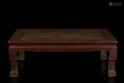 A redwood and fruit wood low table (defects) China, late Qing dynasty (1644-1911) (105x35x75 cm.)...