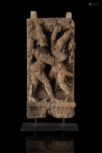 A carved wood panel with deities (defects) India, 18th/19th century (h. 36.5 cm.)...