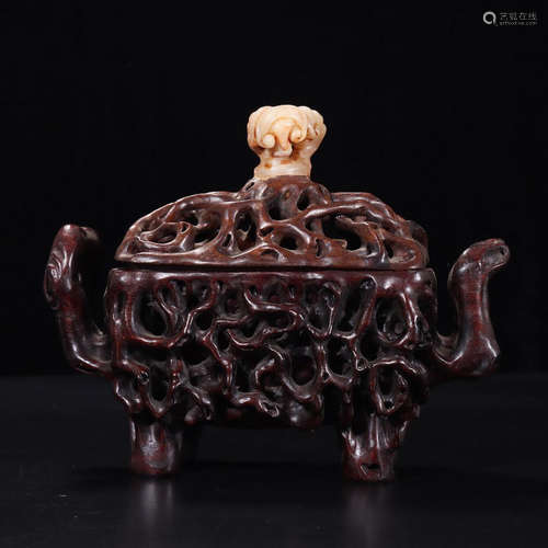 A Chinese Red Sandalwood Piercing Incense Burner