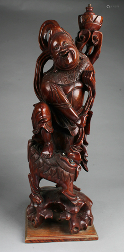 A Carved Wooden Statue