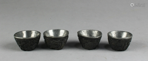 A Group of Four Chinese Antique Silver Cups