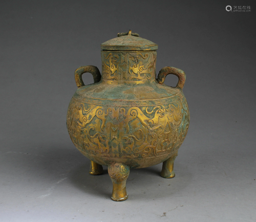 A Bronze Tripod Jar With Lid