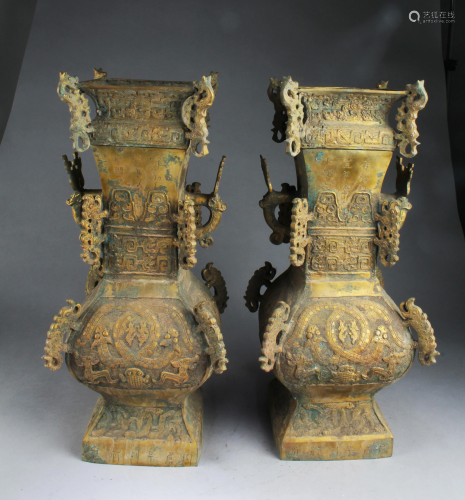 A Pair of Bronze Containers