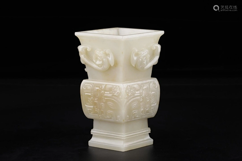 HETIAN WHITE JADE BEAST-FACE PATTERNING FLO…