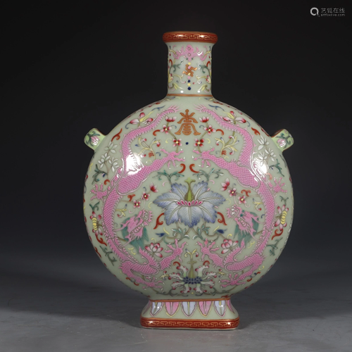 A QIANLONG MARK FAMILLE ROSE DRAGON AND…