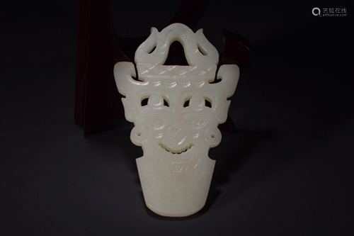 A HETIAN JADE BEAST FACE ORNAMENT