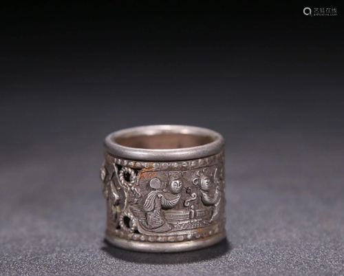 A SILVER CHARACTER STORY CASTED RING