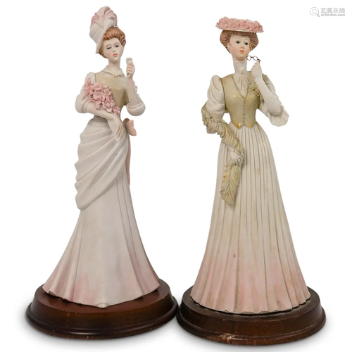 Pair of Pucci Arnart Porcelain Figurines