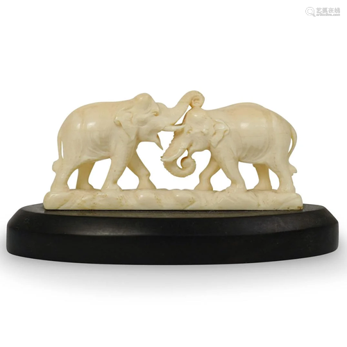 Carved Bone Fighting Elephants