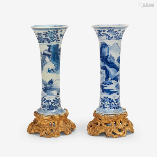 A pair of Louis XV style gilt-bronze mounted Kangxi