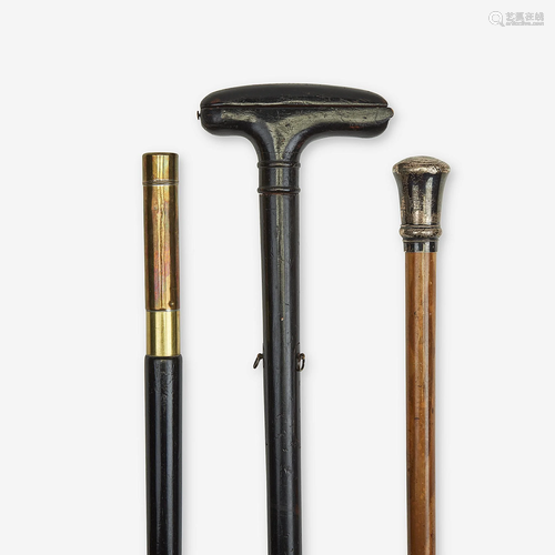 A group of three measure canes, Various dates…