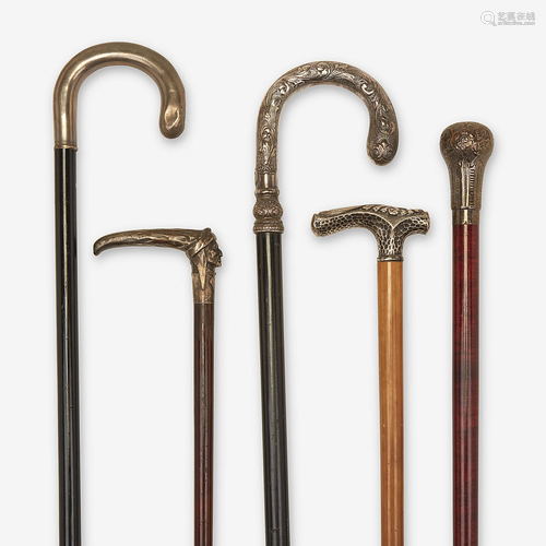 A group of five silver-mounted canes, Various dates