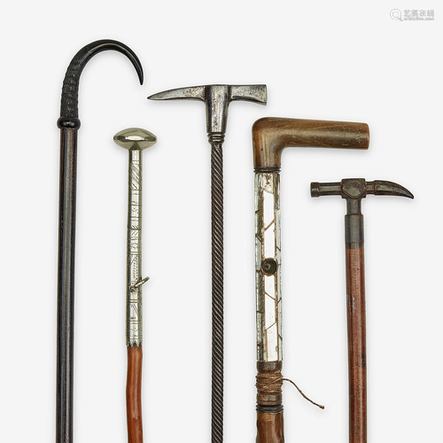 A group of five walking sticks pertaining to h…