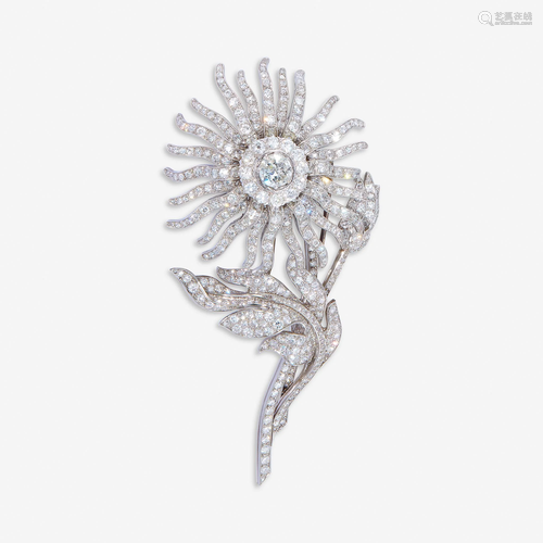 A diamond and platinum brooch,