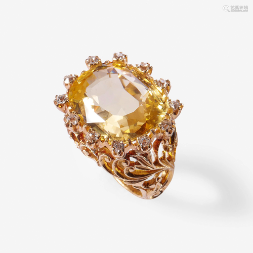 A yellow sapphire, diamond, and eighteen karat …