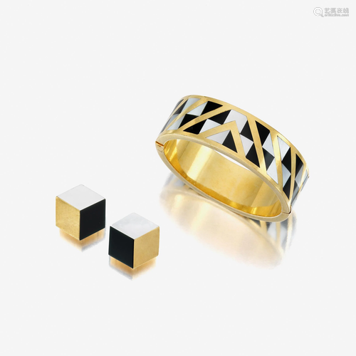 An eighteen karat gold, mother-of-pearl, and black jade