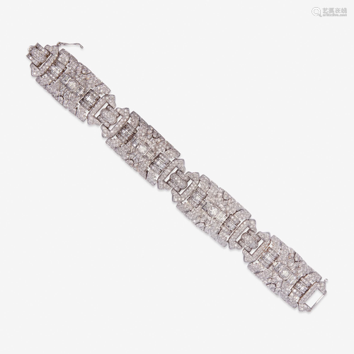 A diamond and eighteen karat white gold strap bracel…