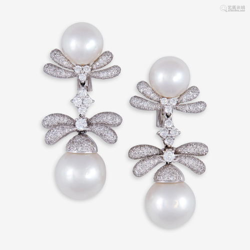 A pair of South Sea pearl, diamond, and eighteen…