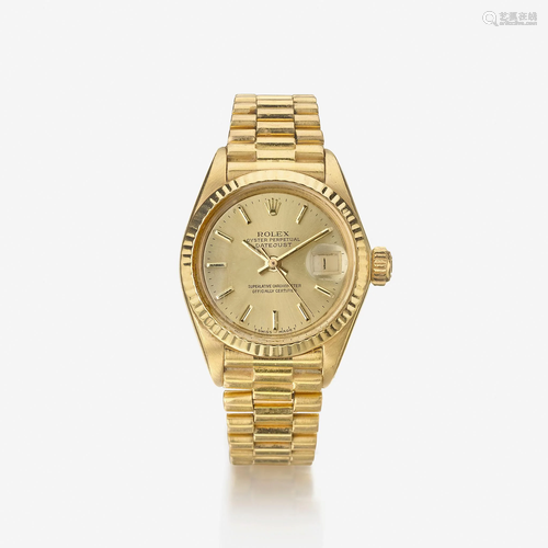 An eighteen karat gold, automatic, bracelet wristwatch