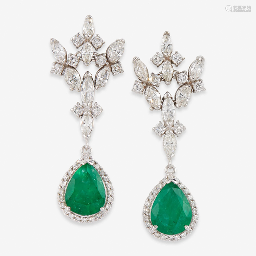 A pair of emerald, diamond, and eighteen karat …