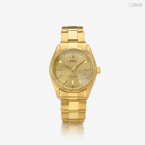 An eighteen karat gold, automatic, bracelet wristwatch,