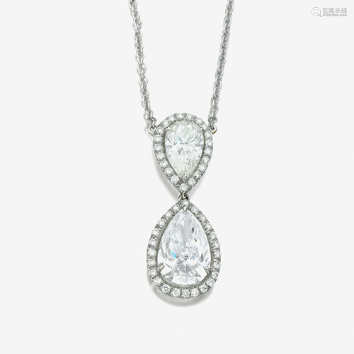 A diamond and platinum pendant necklace,