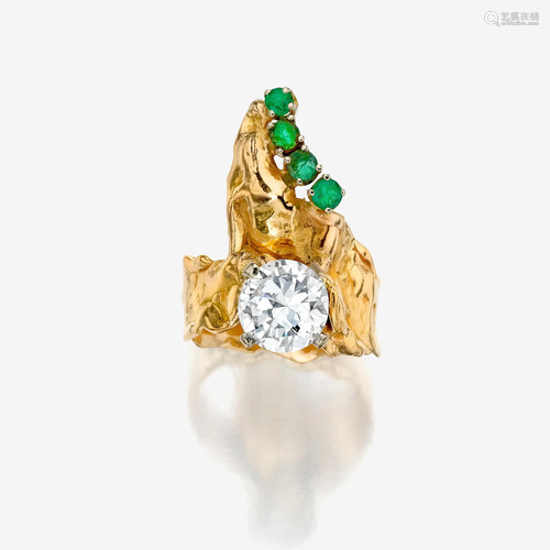 A diamond, emerald, and fourteen karat gold ring,