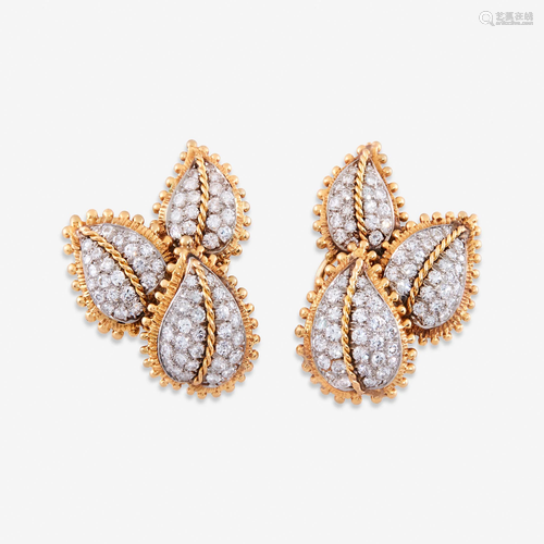 A pair of fourteen karat gold, platinum, and diamond