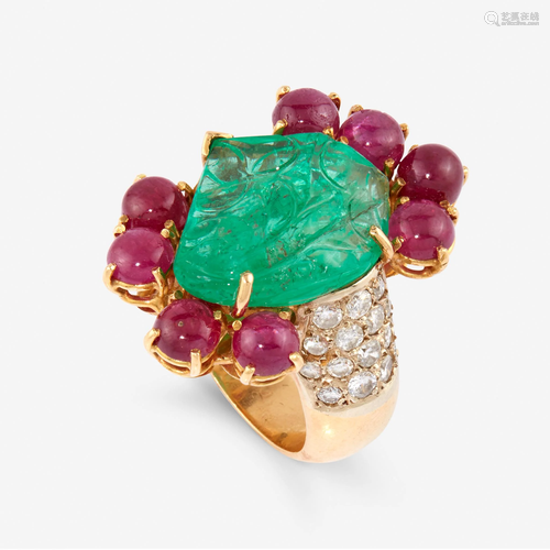 A carved emerald, ruby, diamond, and eighteen karat