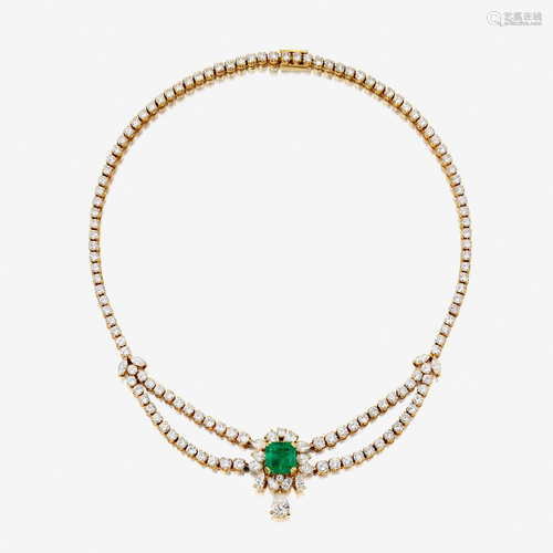 An eighteen karat gold diamond and emerald neckla…