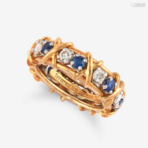 A diamond, sapphire, eighteen karat gold, and plat…