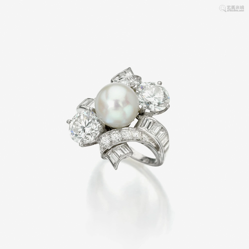 A cultured pearl, diamond, and platinum ring,