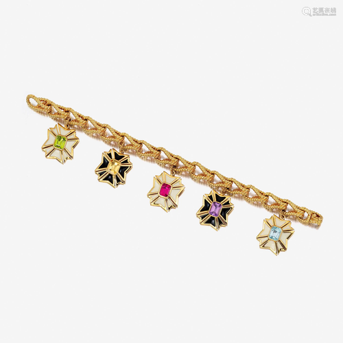 A gem-set, enamel, and eighteen karat gold charm