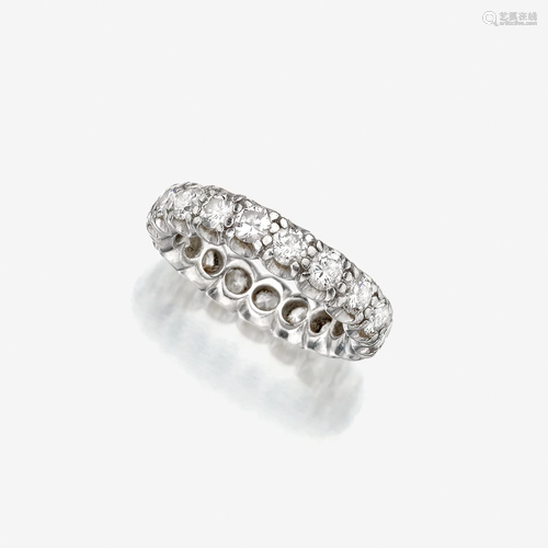 A diamond and platinum eternity band,