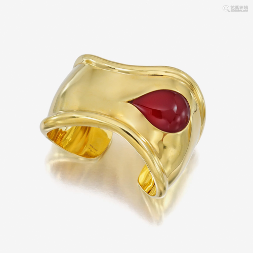 An eighteen karat gold and carnelian cuff bracelet,