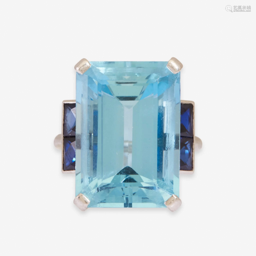 An aquamarine, sapphire, and platinum ring, …