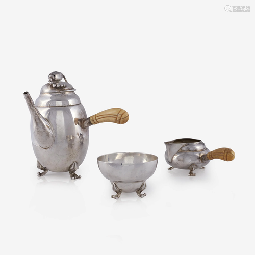 An American sterling silver three-piece tea service,