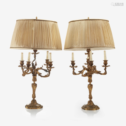 A pair of Louis XV style gilt-bronze candelabra, Late