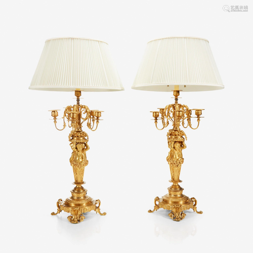 A pair of Napoleon III ormolu five-light figural