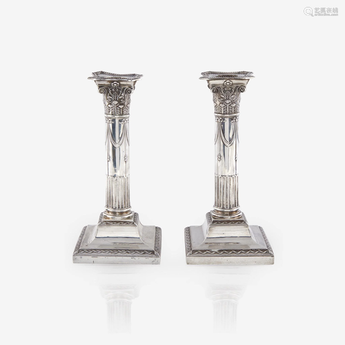 A pair of Edward VII weighted sterling silver