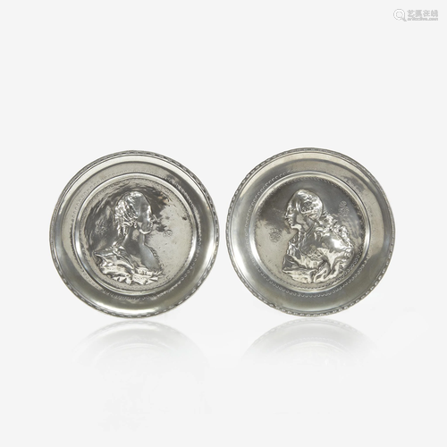 A pair of Continental Royal commemorative pewter