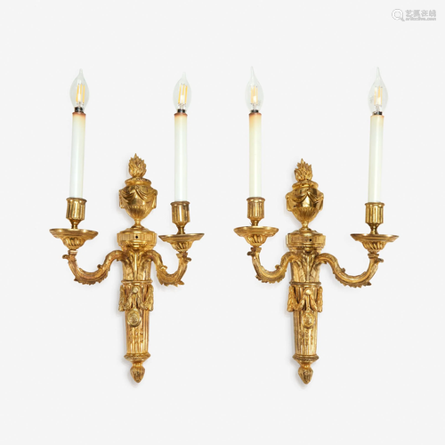 A pair of Louis XVI gilt-bronze two-light sconces, late