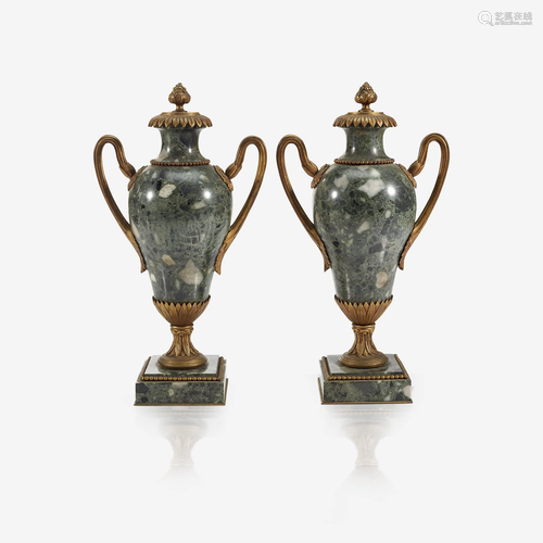 A pair of Louis XVI style gilt-bronze mounted specimen