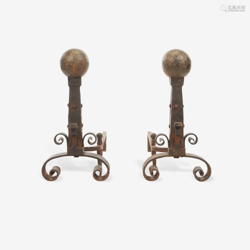 A pair of wrought iron andirons, Late 19th/early 20th