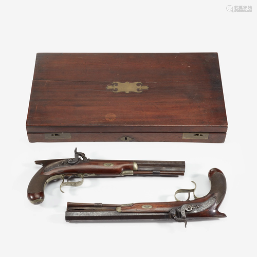 A cased pair of English percussion cap dueling pistols,