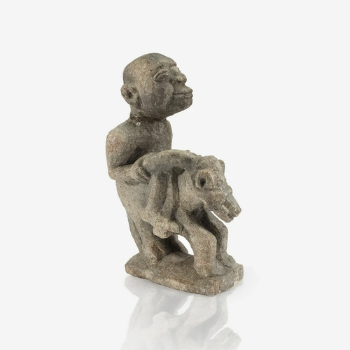 A Kissi stone equetrian figure, pomdo, Guinea