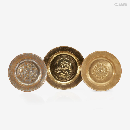 A group of three Continental repoussé brass alms