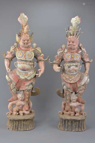 A large pair of Chinese Tang Dynasty (untested) painted pottery Lokapala figures