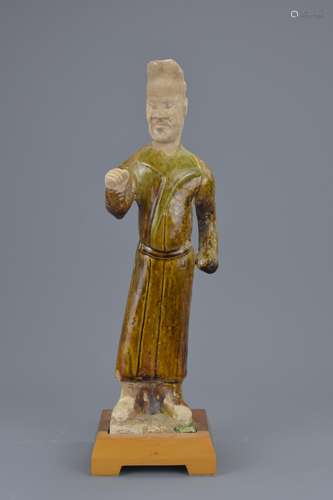 A Chinese Tang Dynasty (618-907AD) Sancai glazed pottery foreign groom figure