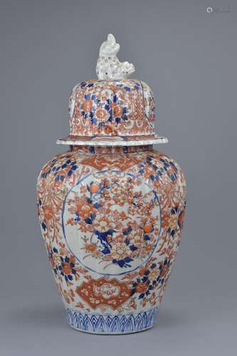 A large Japanese 19th C. Imari porcelain jar and cover